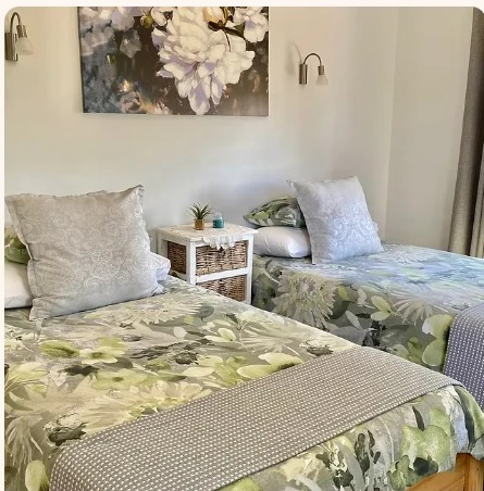 Room Four with two three-quarter beds