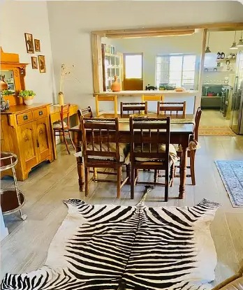 The farmhouse dining room and wooden table