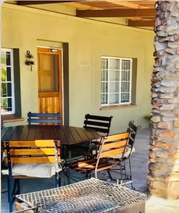 The sunroom and shaded verandah